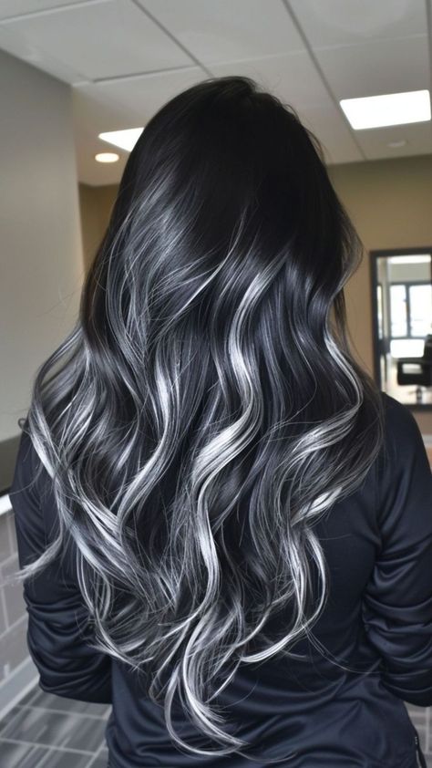 Achieve a breathtaking balayage look with striking black highlights and shimmering silver hair color! This trendy style adds depth and dimension, creating a beautiful contrast that is perfect for any occasion. Our premium hair extensions make it easy to sport this fabulous color. Enjoy a special 22% off for Halloween with code P22! Elevate your hair game today and dazzle everyone with your stunning new style! #Balayage #BlackHighlights #SilverHair #HairExtensions #HairColorInspo Black Hair With Silver Lowlights, Long Black And Silver Hair, Black Hair With Streaks Of Blonde, Black Lowlights In Light Brown Hair, Black Hair Silver Extensions, Black Hair Platinum Balayage, Black With Low Lights Hair, Black Hair With Dark Grey Highlights, Black To Grey Balayage