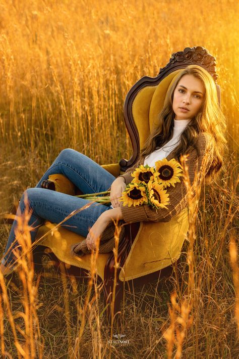 Fall Field Senior Pictures, Senior Pictures In Chair, Senior Picture Ideas Painting, Senior Picture Ideas With Sunflowers, Senior Sunflower Pictures, High Grass Photoshoot, Senior Picture Chair Poses, Creative Senior Photoshoot Ideas, Senior Pictures With Sunflowers