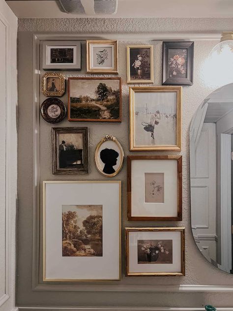 gallery wall in small powder room Powder Room Gallery Wall, Picture Wall Display, Family Picture Wall Ideas, Creative Family Pictures, Powder Room Art, Room Under The Stairs, Family Picture Wall, Picture Display Wall, Apartment Hallway