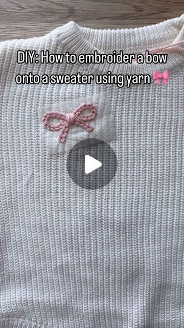 Aspen Lyn Outlet | Hand-Embroidery on Instagram: "How to embroider a bow onto a knit sweater using yarn.  Yarn is a weight 4 from yarn bee!  . . . . #diyembroidery #sulky #embroiderykit #beginnerembroidery #embroiderytutorial #embroidery #handembroidery #yarnembroidery #mamaandme #personalizedbabyclothes #babyshower #babyshowergift #newbornoutfit #announcementoutfit #newbabyannouncement #babynamesweater #customsweater #namesweater #embroideredsweater #coloradomoms #hospitalbag #firstbirthday#coloradosmallbusiness #womanownedbusiness #kidsclothing #embroiderydiy #genderneutral #embroiderytutorial #chainstitch" Simple Sweater Embroidery, Christmas Sweater Embroidery Pattern, Embroidery On Knitting Tutorials, Embroidery Designs On Sweaters, Chain Stiching Ideas, Embroidery With Yarn Letters, Chunky Yarn Embroidery, Bow Embroidery Tutorial, Knit Sweater Embroidery Diy