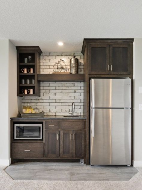 Wet Bar Ideas Full Fridge, Finished Basement Ideas With Kitchen, Small Kitchen Ideas For Basement, Very Small Family Room Ideas, Makeup Counter Ideas, Kitchenette For Basement, Wet Bar Kitchenette, Knotty Alder Cabinets With Brick Backsplash, Wet Bar Ideas With Refrigerator