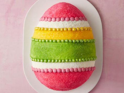 The hardest part of this cake is making an egg shape. Use the following step-by-step instructions to form the perfect egg-shaped cake, before decorating it to fit your Easter party. Easter Pie, Easter Egg Cake, Easter Cake Recipes, Easter Sweets, Easter Desserts Recipes, Egg Cake, Easter Cake, Bunny Cake, Hot Cross Buns