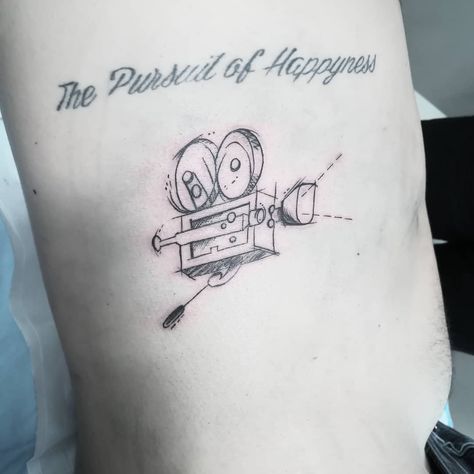 Video camera tattoo design Video Camera Tattoo, Filmmaker Tattoo, Camera Tattoo Design, Camera Tattoos, Scene Tattoo, Film Tape, Laser Removal, Movie Tattoo, Camera Tattoo