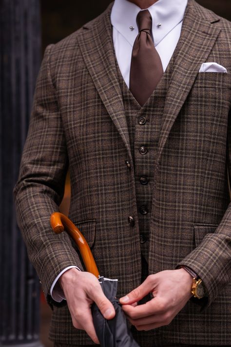 Make a statement in the Brown Plaid Slim-Fit Suit 3-Piece - VIOSSI. This ensemble blends sophistication and style, ensuring a confident and elegant look for any occasion #brownsuit #plaidstyle #slimfitsuit #mensfashion #sophisticatedlook #statementoutfit #elegantstyle #suitup #confidenceboost #menswear Brown Plaid Suit Men, Brown Mens Suit, James Bond Suit, Plaid Suit Men, Bond Suits, Groom Suits, Suit Styles, Suit Stores, Herringbone Suit