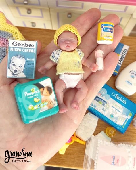 What’s your favorite miniature baby item? Share in the comments! 👇🏻 Why are miniature baby items so irresistibly cute? There’s just something about tiny diapers, itty-bitty bottles, and mini baby dolls that makes us all go “Awww!” Maybe it’s because they remind us of the precious early days of infancy. Or perhaps it’s the novelty of seeing familiar objects shrunk down to adorable proportions. Whatever the reason, miniature baby items have captured our hearts! From collectors to crafters to -... Nuk Pacifier, Small Baby Dolls, Baby Cereal, Silicone Baby Dolls, Cotton Balls, Mini Things, Silicone Babies, Reborn Baby, Itty Bitty