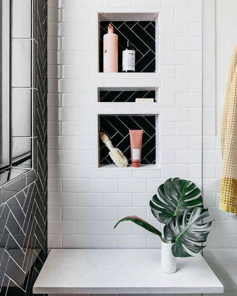 @sarahmontgomerydesign posted to Instagram: Here's another view of our latest bathroom renovation. My favorite part might be the shower niche! I'd also like to give a shout out to @kirstin_ess for making great products to use and style with. Photo by @margaretrajic #sarahmontgomerydesign #sarahmontgomerydesignblog #chicagodesigner #chicagodecorator #iamtheeverygirl #showemyourstyled #apartmenttherapy #chicagodesigncommunity #chicagovintage #ruedaily #interiorinspo #myeclecticmix #mydecorvibe #bl Black White Herringbone Tile, Black And White Herringbone Bathroom, White Shower With Black Niche, Black And White Niche, White Shower Black Niche, Black And White Shower Niche, Black Niche Bathroom, Black And White Bathroom Shower Tile, Black And White Tile Showers