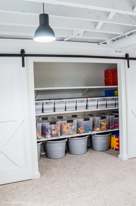 Basement Playroom Toy Storage, Storage Basement Organizing Ideas, Storage Room For Decorations, Basement Into Playroom, Small Basement Remodel Low Ceilings Decorating Ideas, Storage Basement Ideas, Storage Rooms Ideas, Playroom Wall Of Storage, Storage Room Inspiration