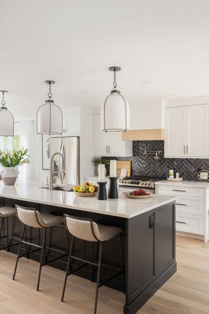 Bellefeuille House - Transitional - Kitchen - Montreal - by Laurie Yapp Design | Houzz Kitchen Island Grey Countertop, Kitchen Island Trim Ideas Modern, Kitchen With Black Island White Cabinets, Charcoal Kitchen Island White Cabinets, Kitchen Island Modern Design, Kitchen Island Black Countertops, Black Kitchen Island White Cabinets, White Kitchen Dark Island, Iron Ore Kitchen Island