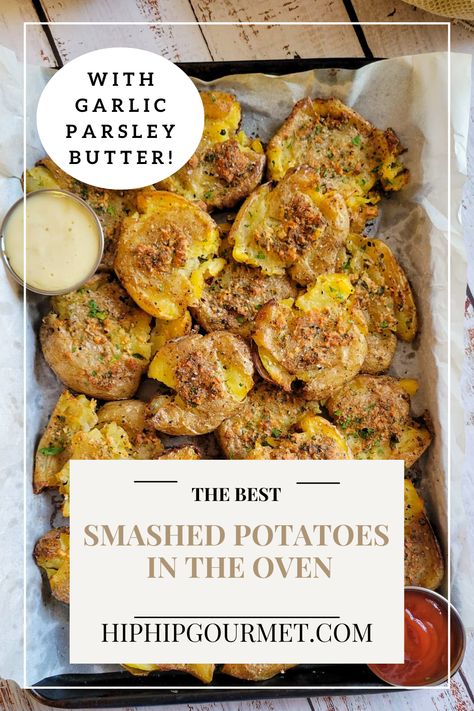 smashed potatoes piled onto a parchment lined baking sheet with 2 dipping sauces Smashed Golden Potatoes, Oven Smashed Potatoes, Easy Smashed Potatoes, Golden Potato Recipes, Smash Potatoes, Parsley Butter, Smashed Potatoes Recipe, Potatoes In Oven, Yellow Potatoes