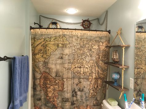 Our boys pirate bathroom. Map shower curtain, pirate ships, globe, etc Pirate And Mermaid Bathroom, Pirate Bathroom, Map Shower Curtain, Zen Bathroom Decor, World Map Fabric, World Map Photo, Vintage Shower Curtains, Vintage Style Bathroom, Vintage Shower Curtain