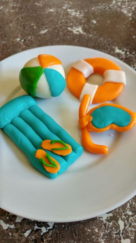 I made these pool party birthday cake fondant decor accessories - snorkel mask, inner tube, beach ball, pool float and flip flops Pool Party Birthday Cake, Pool Birthday Cakes, Retro Pool Parties, Swimming Pool Cake, Ocean Birthday Cakes, Birthday Cake Fondant, Party Birthday Cake, Pool Party Cakes, Pool Cake