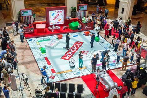 Giant Monopoly at Mall Of The Emirates Giant Monopoly, Corporative Events, Brand Activation Ideas, Creative Marketing Campaign, Experiential Marketing Events, Guerrilla Advertising, Board Game Themes, Game Booth, Exhibition Display Design