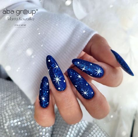 Long Round Blue Nails with Stars Dark Blue With Snowflakes Nails, Blue Nail Designs Winter, New Years Nails Blue, Blue New Years Nails, Stars Nails Design, Nails Blue Winter, Blue Nails With Stars, Black Blue Nails, Glitter Blue Nails