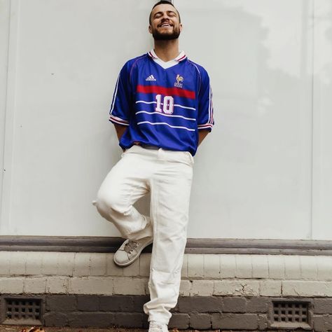 Vive La France , Vive le Football Elegance meets victory in the France 1998 home jersey. The iconic rooster emblem, the three proud stars, and the tricolor bands - it’s a masterpiece of design. With this jersey, you can reimagine France’s 1998 World Cup victory . Stand in the shadow of legends. Zinedine Zidane’s magical strikes, Emmanuel Petit’s last-gasp winner, and Marcel Desailly’s impenetrable defense. This jersey is the closest you can get to the stars who made a nation believe. #fran... France Jersey Outfit, Retro Soccer Jersey Outfit, 90s Men Fashion, France Kit, France Jersey, 1998 World Cup, Bloke Core, Soccer Style, Jersey Fits