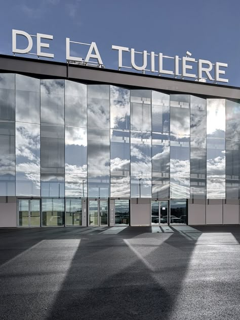 Signage for the Stade de la Tuilière in Lausanne - Fonts In Use Facade Signage, Liberty State Park, Building Signage, Cross County, Signage Board, Signage And Wayfinding, Architecture Firms, Commercial Signs, Building Signs