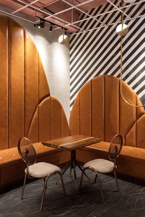 Confectionery Shop, Monochromatic Artwork, Ceiling Texture, Colonial Times, Concrete Building, Banquette Seating, French Bistro, Standing Shelves, Indian Sweet