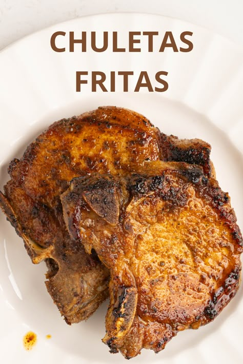 Chuletas Fritas (aka Puerto Rican Fried Pork Chops) are seasoned with a blend of classic Puerto Rican spices and come together in under 30 minutes. They develop that deliciously flavorful crust on the outside, while staying juicy and moist on the inside. Served with your favorite veggies and a simple salad, they make an easy weeknight meal. Puerto Rican Fried Pork, Puerto Rican Pork Chops, Spanish Pork Chops, Puerto Rican Pork, Pan Fried Pork Chops, Marinated Pork Chops, Steak And Onions, Boricua Recipes, Fried Pork Chops