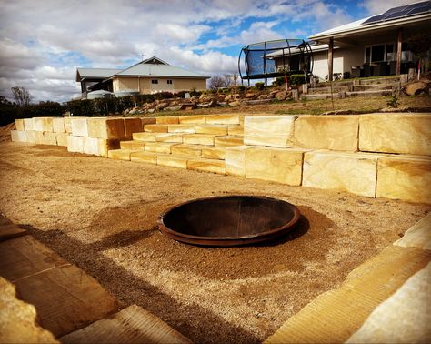 Sandstone block seating around fire pit. Sandstone stair case Fire Pit Sandstone, Sandstone Fire Pit, Seating Around Fire Pit, Firepit Design, Backyard Hardscape, Pool Gazebo, Gazebo Ideas, Stone Paving, Paving Design