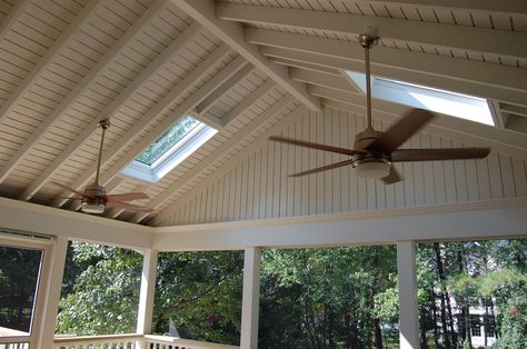 same ceiling rafters and columns without the skylights Covered Porch Skylights, Porch Roof With Skylights, Racked Ceiling, Patio Roof With Skylights, Covered Deck With Skylights, Skylight Between Rafters, Ceiling With Skylights, Skylight Exposed Truss, Ceiling Rafters