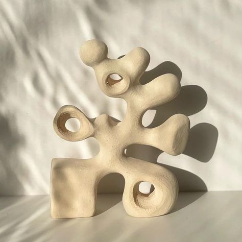 Carmelina | Ceramicist on Instagram: "The Oompa Loompa Sculpture 🤍 Love the White raku abstract sculpture with the organic finish🤍 H/36cm W/28cm #ceramics #pottery #sculptureabstract #sculpture #art #abstractart #oneofakind #unique #homedecor #decorhomestyle #interiordesign #interiorstyling #unglazedceramics #unglazed" Ceramics Abstract Sculpture, Abstract Ceramics Pottery, Pottery Abstract Ceramic Art, Subtractive Clay Sculpture, Clay Sculpture Art Project Ideas, Abstract Pottery Sculpture, Ceramics Ideas Sculpture, Abstract Clay Sculpture Ideas, 3d Sculpture Art