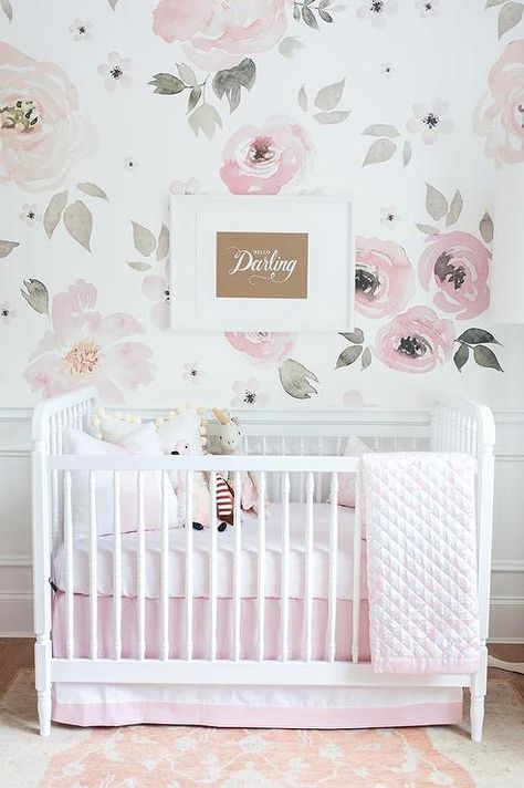 A Perfectly Smitten Hello Darling Print, mounted on walls covered in Jolie Wallpaper lined with white wainscoting, is positioned above a white Franklin and Ben Crib accented with Olio Crib Bedding and sat on a Surya Normandy Taupe Area Rug. Blush Pink Nursery, Ideas Habitaciones, Baby Nursery Inspiration, Girl Nursery Room, Floral Nursery, Pink Nursery, Project Nursery, Baby Bedroom, Nursery Inspiration