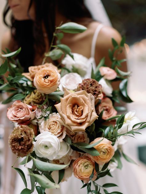 Muted fall bridal bouquet with toffee roses, lisianthus, and ranunculus. Toffee Rose, Toffee Roses, Fall Bridal Bouquet, Rose Bridal Bouquet, Bridal Bouquet Fall, Rose Arrangements, Wedding Show, Ranunculus, Rose Bouquet