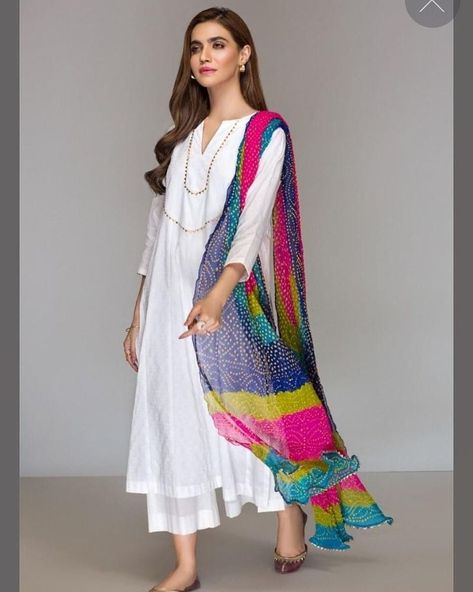 Click in this pin for more styling inspiration with white kurta, kurtis and Outfits. White Salwar Suit With Colourful Dupatta, Khaddar Kurta Designs, Plain White Outfit, Suit Designing Ideas, Colourful Dupatta, Plain Dress Designs, Colorful Dupatta, White Salwar, Plain White Dress