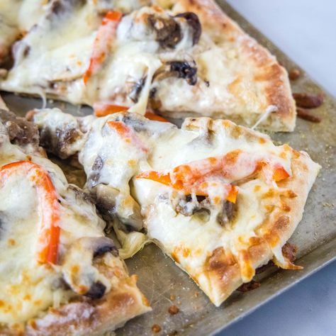 Philly Cheesesteak Pizza Philly Cheesesteak Pizza, Arbys Beef And Cheddar, Cheesesteak Pizza, White Garlic Sauce, Chili Relleno Casserole, White Pizza Sauce, Cheesesteak Sandwich, Cheesesteak Sliders, Philly Cheese Steak Sliders