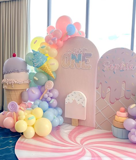 Sophia’s Sweet One 🍦🍬🍭 Backdrop + Balloons + decor @janettloveshop Bounce House + Ball Pit @bouncebrightparty #sweetone #sweetonetheme #sweetonebirthday #sweetonebackdrop #sweetoneballoons #sweetoneballoongarland #icecream #icecreamthemedparty #candyland #candylandtheme #candylandparty #firstbirthday #firstbirrhdayideas Two Sweet Balloons, Ball Theme Birthday Decoration, Sprinkles Backdrop, Sweet One Backdrop, Sweet One Birthday Theme, Candyland Backdrop, Ball Theme Birthday, Ice Cream Parlor Party, Backdrop Balloons