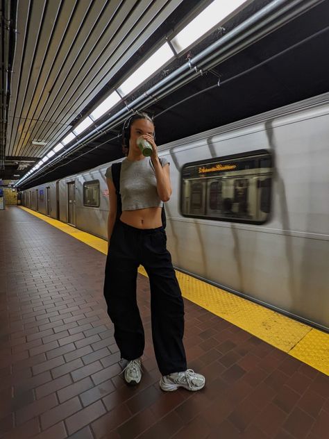 New balance shoes, Zara parachute pants, headphones, subway, New York, Toronto Black Parachute Pants Outfit Summer, Black Parachute Pants Outfit, Zara Parachute Pants, Subway Photoshoot, Trendy Headphones, Parachute Pants Outfit, Summer Pants Outfits, Balance Shoes, European Summer