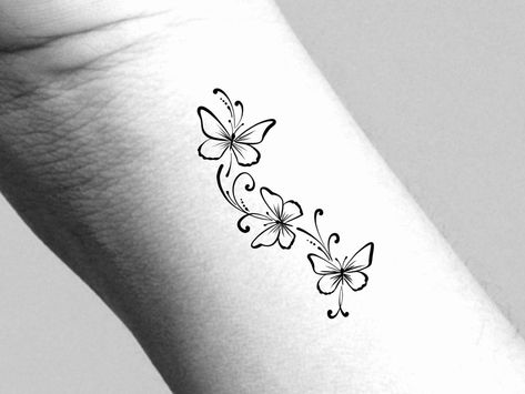 Small Flower Tattoos With Names, Butterfly Bracelet Tattoo, Happiness Is A Butterfly Tattoo, 3 Butterflies Tattoo, 3 Small Butterflies Tattoo, Butterfly Tattoo With Words, Little Butterfly Tattoo, 3 Butterfly Tattoo, Butterfly Tattoo Ideas