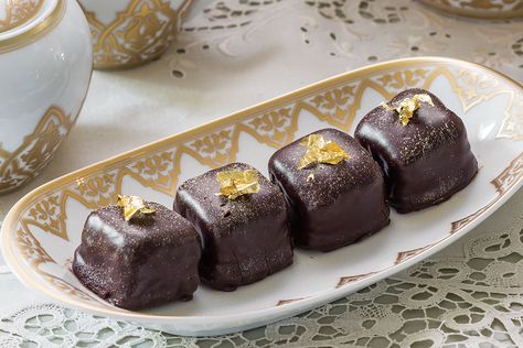 These miniature marvels will be a hit at your next teatime. Save Recipe Print Chocolate Petit Fours Serves: 68   Ingredients ⅔ cup unsalted butter, softened 1 3⁄4 cups granulated sugar 1 teaspoon vanilla extract 2 large eggs 1 (4-ounce) bar bittersweet chocolate, melted and cooled 2 1⁄2 cups cake flour 1 1⁄4 teaspoons baking soda […] Chocolate Petit Fours Recipe, Brownie Petit Fours, Chocolate Cake Petit Fours, Petit Four Flavors, Chocolate Petit Fours, Petit Four Icing Easy, Petit Four Icing, Fruit Tartlets, Orange Zest Cake