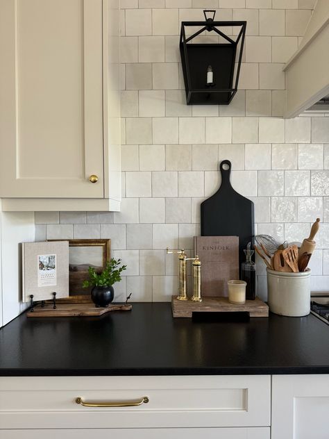 Modern Transitional Home Decor, Classic Traditional Kitchen, Modern Transitional Home, Cookbook Display, Kitchen Vibes, Kitchen Countertop Decor, Traditional Kitchen Design, Black Countertops, Countertop Decor