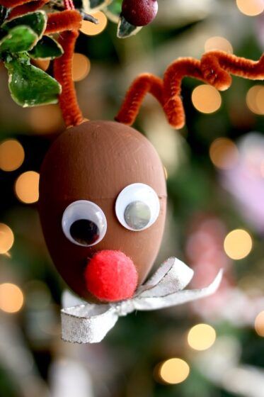 Plastic Egg Reindeer Craft Egg Christmas Ornaments, Rain Stick Crafts, Paper Mache Crafts For Kids, Egg Christmas, Happy Hooligans, Decorative Eggs, Easter Egg Tree, Reindeer Craft, Reindeer Ornament