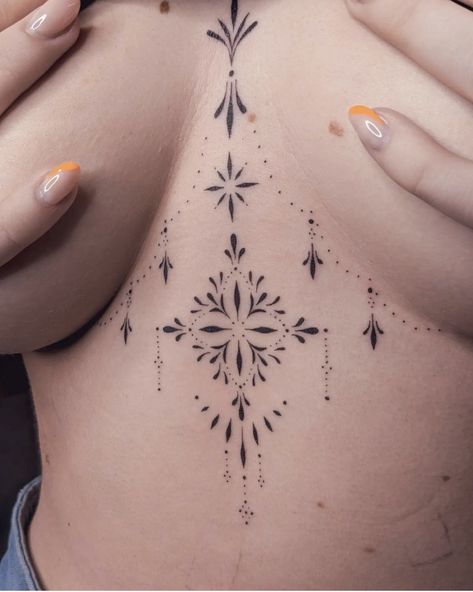 Sternum And Stomach Tattoo, Ornament Chest Tattoo, Breast Bone Tattoos For Women, Breast Tattoos For Women Middle, Bisexual Tattoo Ideas, Mid Chest Tattoo Female, In Between Breast Tattoo, Middle Breast Tattoo, Under Breast Tattoos For Women