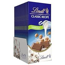 Lindt White Chocolate, Chocolate Bark Christmas, Dark Milk Chocolate, Hazelnut Milk, Milk Chocolate Bar, White Chocolate Bar, Famous Chocolate, Valentines Day Chocolates, Milk Chocolate Candy