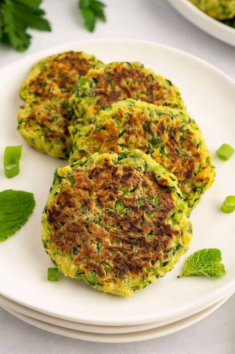 These herby zucchini fritters are crispy, golden, and delicious! http://worldofvegan.com/vegan-zucchini-fritters Vegan Zucchini Fritters, Zucchini Fritters Recipe, Veggie Fritters, Leafy Green Salads, Fritters Recipe, Healthy Plant Based Recipes, Vegan Zucchini, Plant Based Cookbook, Vegan Kids