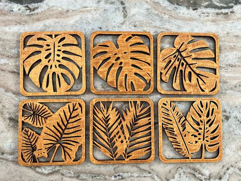 Set of 6 Wood Leaf Pattern Coasters - Monstera Leaf, Taro Leaf, Fern, Banana Leaf Laser cut from real wood! Wood grain and stain vary based on natural wood grain. (Pictured cup not included) Taro Leaf, Wood Leaf, Laser Cut Decor, Laser Engraved Gifts, Punch Needle Patterns, Water Based Stain, Cute Animals Images, Banana Leaf, Scroll Saw