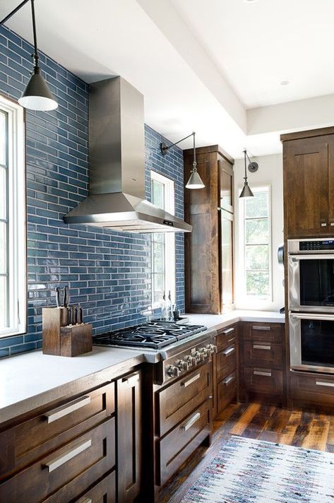 Kitchen with Rustic Wood Cabinetry and Blue Tile Blue Tile Backsplash Kitchen, Blue Backsplash Kitchen, Espresso Kitchen Cabinets, Solid Wood Kitchen Cabinets, Espresso Kitchen, Blue Backsplash, Solid Wood Kitchens, Brown Kitchens, Wood Kitchen Cabinets