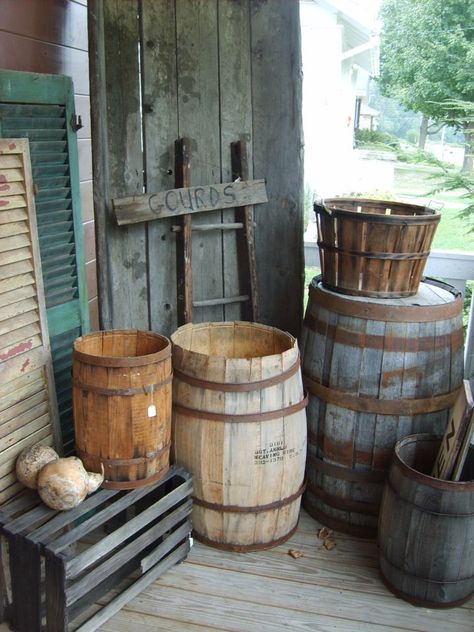 ` Primitive Outdoor Decor, Primitive Porch, Barrel Crafts, Country Porches, Wooden Barrels, Americana Design, Primative Decor, Wagon Wheels, Pantry Boxes