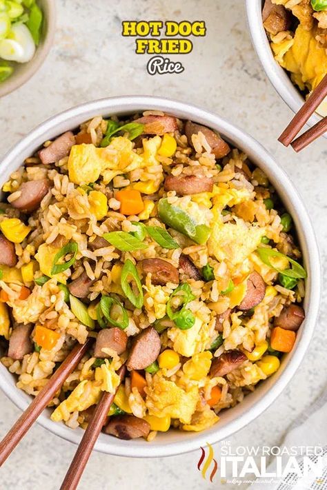 Hot Dog Fried Rice is savory, satisfying, and bursting with flavor. This mouthwatering hot dog recipe features sauteed onions, garlic, soy sauce, and sesame oil. It delivers the comforting flavors of American cuisine with a snappy Asian twist. Hot Dogs And Rice, Baked Chili Cheese Dogs, Easy Delicious Casseroles, Casserole Meals, Slow Roasted Italian Recipes, Geo Board, Slow Roasted Italian, Hot Dog Toppings, Simple Dinner Recipes