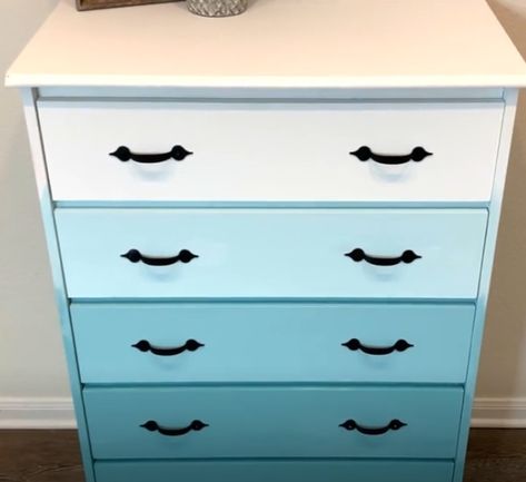 Find out how you can breathe new life into dressers, shelving units, and other furniture by using this stylish and effective ombre painting technique. Ombre Furniture Painting Diy Wood, Ombre Painting Furniture, Ombre Dresser Drawers, Blue Ombre Dresser, Ombré Dresser, Ombré Furniture, Dresser Remodel, Ombre Painting, Painting Fabric Furniture