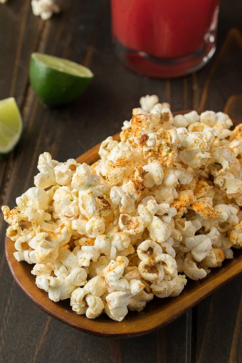 Mexican Popcorn is an easy and fun snack, or appetizer for the upcoming Cinco de Mayo celebration. Flavorful Mexican spices are sprinkled over warm, freshly popped popcorn and melted butter and a mixture of tangy, slightly salty cotija cheese and fresh lime zest is added for a lovely taste sensation. #mexicanpopcorn #popcorn #cotijacheese Mexican Popcorn, Popcorn Toppings, Savory Popcorn, Spiced Popcorn, Mexican Appetizers, Mexican Recipe, Popcorn Snacks, Popcorn Recipe, Mexican Spices