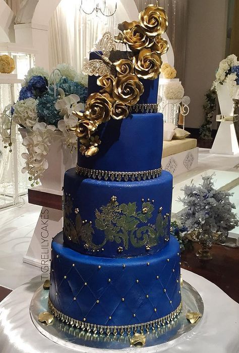 colored wedding cakes blue cake gold flower lilylolacakes Royal Blue And Gold Quinceanera, Blue Quinceanera Theme, Wedding Cake Blue, Royal Blue Cake, Royal Blue Quinceanera, Quince Cakes, Blue And Gold Wedding, Blue Sweet 16, Sweet 15 Party Ideas Quinceanera