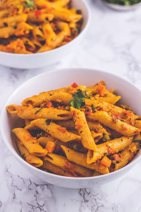 This easy Masala Pasta comes together in about 30 minutes and is the perfect weeknight dinner! This Indian style desi pasta features tender penne pasta coated with flavorful, Indian spiced creamy tomato sauce, lots of veggies, Italian seasoning and fresh cilantro. Just imagine all that goodness! #masalapasta #pastadinner #desipasta #easydinner Desi Pasta, Pasta Indian Style Recipe, Masala Pasta, Pasta Indian Style, Vegetarian Pasta Recipes, Spicy Tomato Sauce, Recipe Indian, Creamy Tomato Sauce, Pasta Dinner Recipes