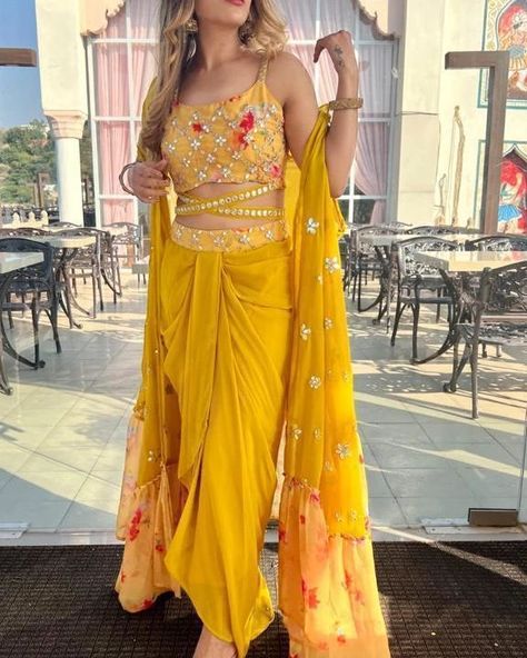 ₹2095 *RESTOCKED DISPATCH STARTS FROM SAT* ❤️❤️❤️❤️❤️❤️❤️ Design No-723 💃STUNNING WEDDING SEASON COLLECTION😍 💛NEW COLOR💛 🌸🌸🌸🌸🌸🌸🌸 This wedding season flaunt ur haldi and mehendi look with this glamorous sarong dress 😍😍😍😍😍😍😍😍 READY TO WEAR 3pcs DRESS EMBELLISHED WITH FOIL... Haldi Function Dress, Haldi Dress Ideas, Haldi Outfit For Bride, Mehendi Look, Mehendi Dress, Indian Outfits Modern, Haldi Ceremony Outfit, Haldi Dress, Haldi Outfits