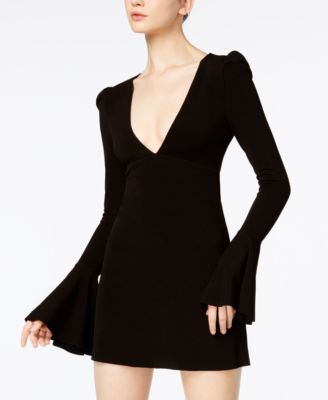 FREE PEOPLE Free People Talk About It Bell-Sleeve Mini Dress. #freepeople #cloth # dresses Black Long Sleeve Mini Dress, Empire Waist Tops, Black Dress With Sleeves, Black Dress Outfits, Grad Dresses, Large Dress, People Talk, Bell Sleeve Dress, Knit Mini Dress