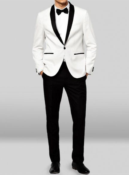 Are you looking to buy a tuxedo? Tuxedos are regarded as one of the most formal types of men's outfits. Consisting of trousers and a matching dinner jacket -- both of which feature satin facing -- they offer a brilliant style that's perfect for nearly all formal occasions. You can wear them to weddings, graduations, bu White Tuxedo Jacket, Groomsmen Outfit, Velvet Dinner Jacket, Chanel Birthday, White Tux, Groomsmen Outfits, Black And White Tuxedo, Wedding Tuxedo, Suit White