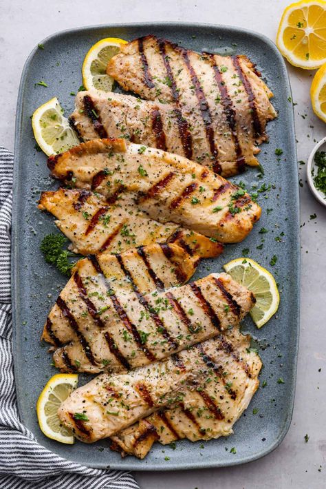 Grilled Tilapia Grilled Tilapia Recipes, Short Ribs Slow Cooker, Grilled Tilapia, Roasted Tomato Salsa, Easy Teriyaki Chicken, Slow Cooker Ribs, Best Seafood Restaurant, The Recipe Critic, Pellet Grill Recipes