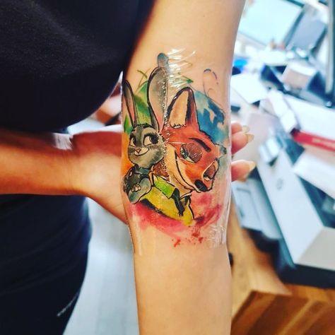 Zootopia Tattoo, Tattoo Ideas Aesthetic, Disney Tattoo, Disney Tattoos, Zootopia, Ideas Aesthetic, Couple Tattoos, Disney Girls, Watercolor Tattoo